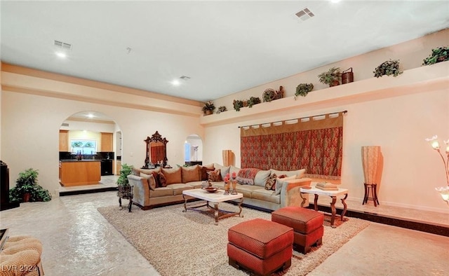 living room with concrete floors