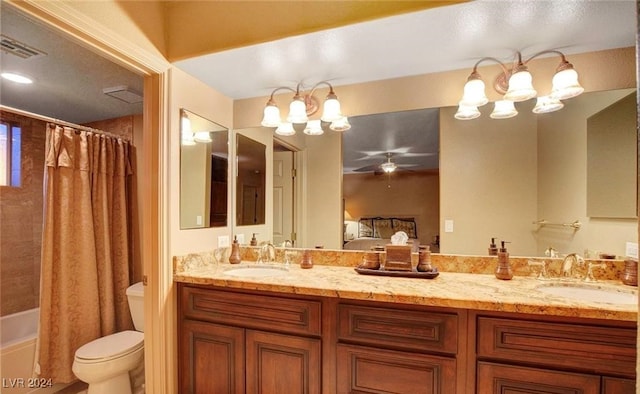 full bathroom with vanity, ceiling fan with notable chandelier, toilet, and shower / bathtub combination with curtain