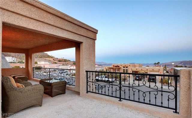 balcony featuring a mountain view