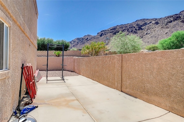 view of patio featuring a mountain view