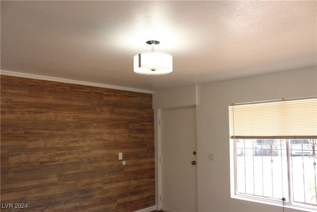 empty room with a textured ceiling