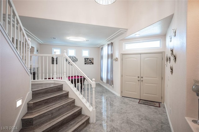 foyer with crown molding