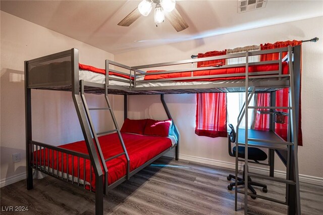 bedroom featuring wood-type flooring