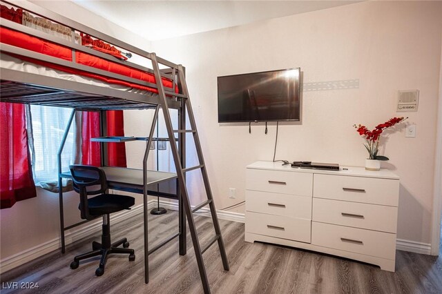 bedroom featuring hardwood / wood-style floors