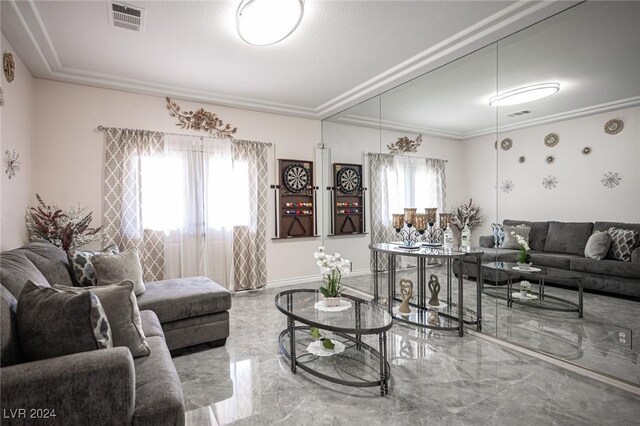 living room featuring crown molding