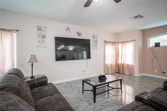 living room featuring ceiling fan