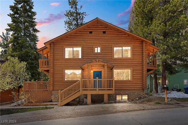 cabin featuring a balcony