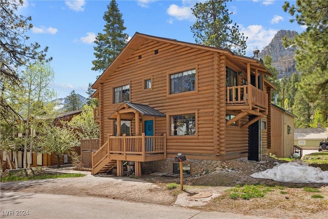 view of log cabin