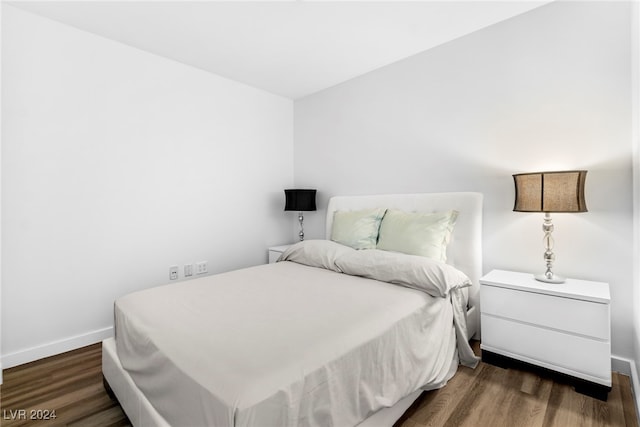 bedroom featuring dark hardwood / wood-style floors