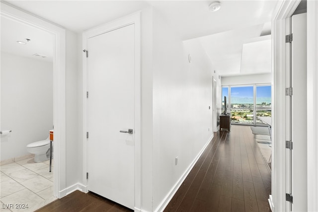 hallway featuring hardwood / wood-style flooring