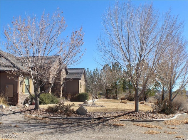 view of home's exterior with stucco siding