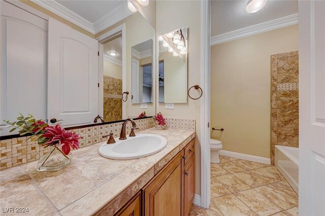 full bathroom featuring tile patterned flooring, shower / washtub combination, toilet, vanity, and ornamental molding