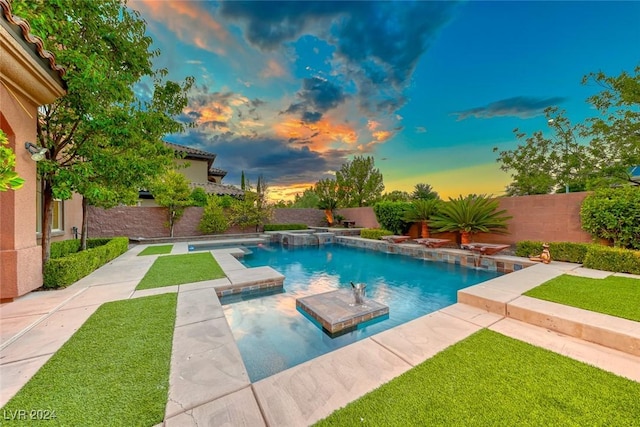 view of swimming pool featuring a fenced in pool, a fenced backyard, and a lawn