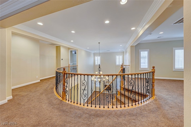 hall featuring crown molding and light carpet