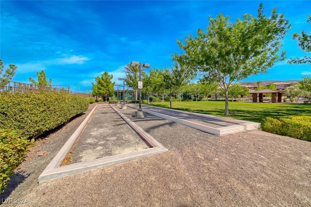 view of community featuring a yard