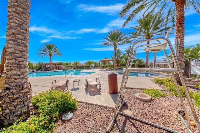 pool featuring a gazebo and a patio