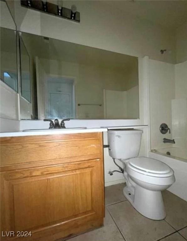 full bathroom with shower / tub combination, vanity, toilet, and tile patterned flooring