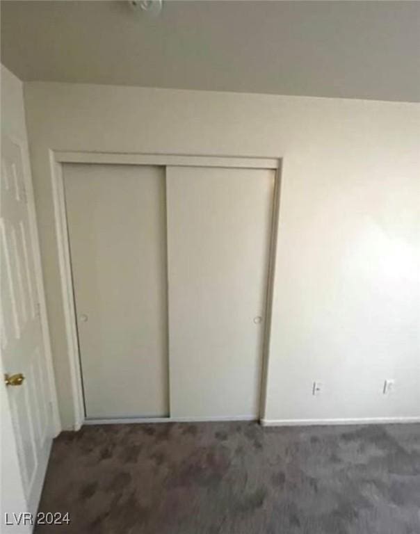 unfurnished bedroom featuring a closet