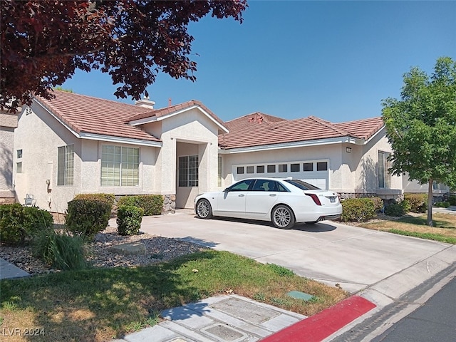 view of front of home with a garage