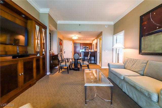 living room with ornamental molding