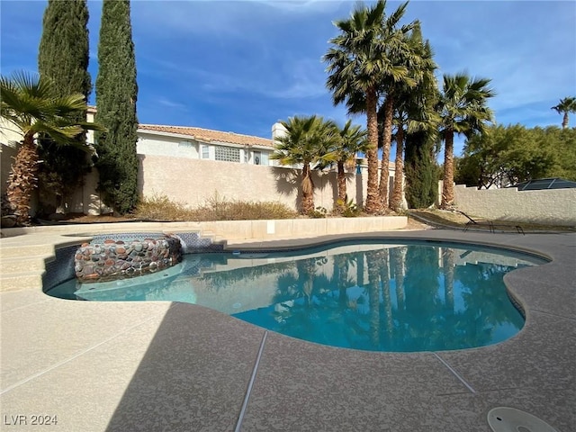 view of swimming pool featuring a fenced in pool and a fenced backyard