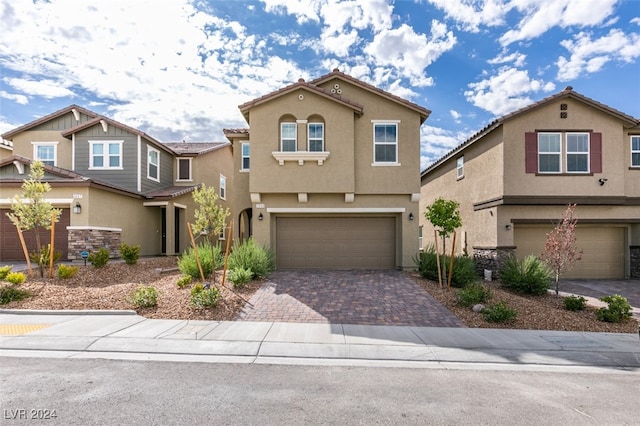 view of front of home with a garage