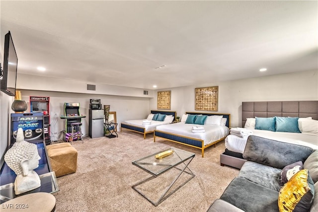 bedroom featuring visible vents, carpet flooring, and recessed lighting