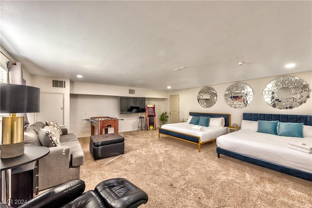 carpeted living room featuring visible vents and recessed lighting