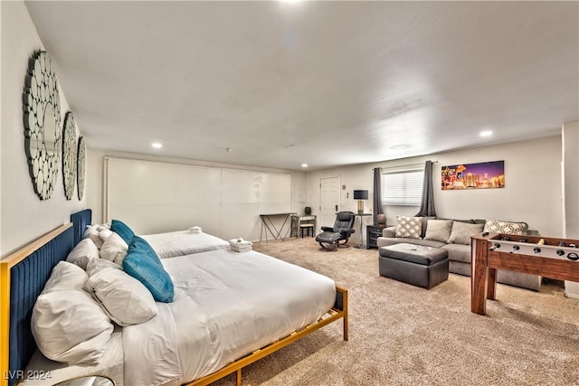 bedroom with recessed lighting and light colored carpet