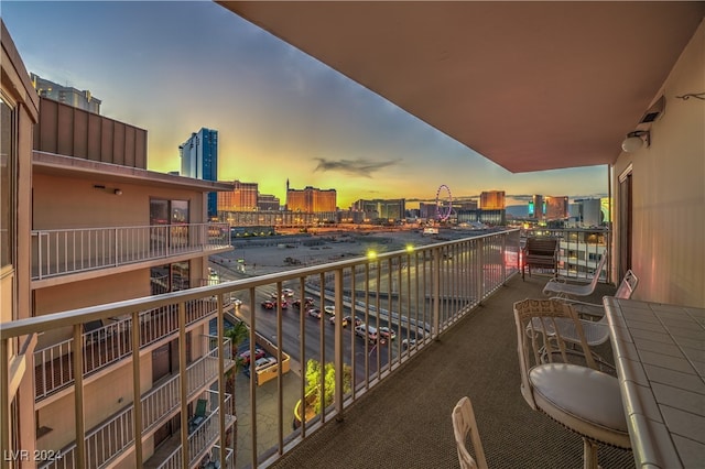 view of balcony at dusk