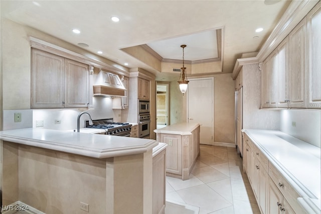 kitchen featuring light brown cabinetry, appliances with stainless steel finishes, a center island, kitchen peninsula, and custom exhaust hood