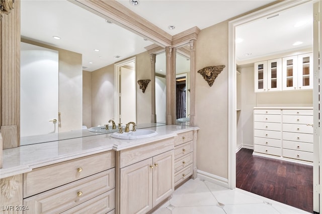 bathroom with vanity and tile patterned floors