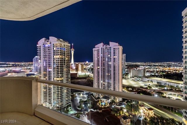 view of balcony at twilight