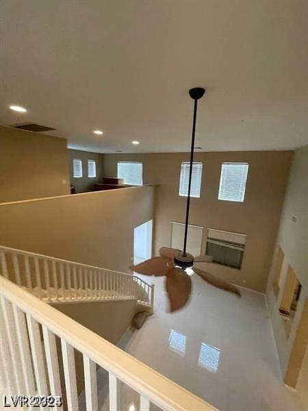 interior details with recessed lighting, visible vents, and ceiling fan