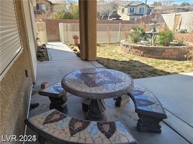 view of patio with a fenced backyard