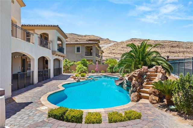 view of pool with a patio