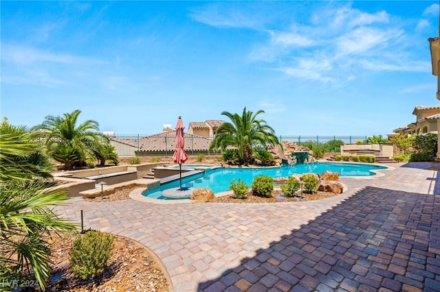 view of swimming pool featuring a patio