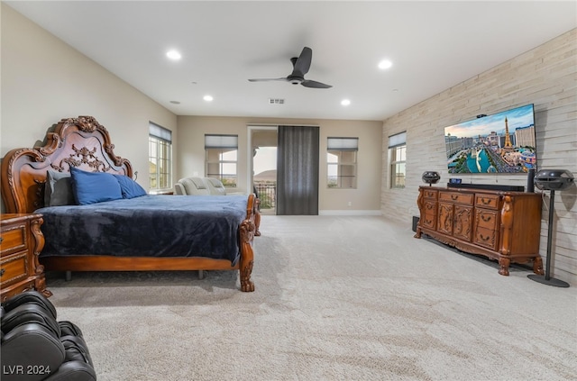 bedroom featuring light carpet and ceiling fan