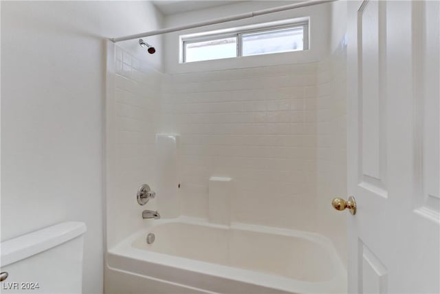 bathroom with toilet and shower / bathtub combination