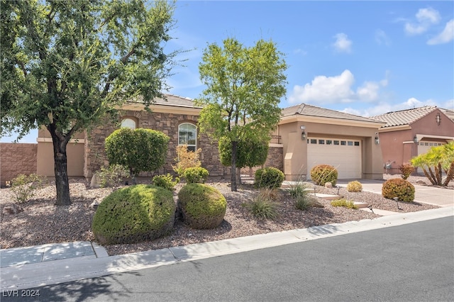 view of front of property with a garage