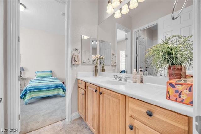 bathroom featuring tile patterned floors and vanity