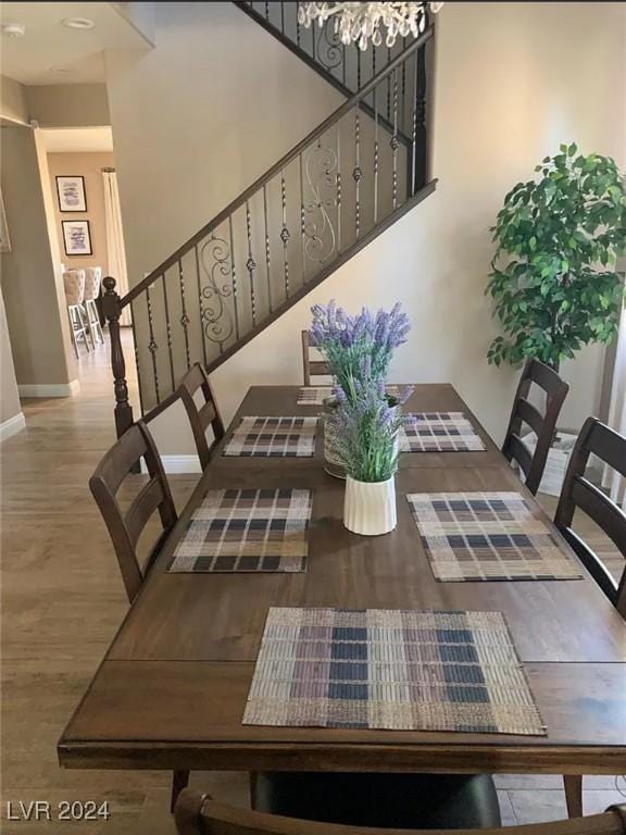 dining room with hardwood / wood-style floors