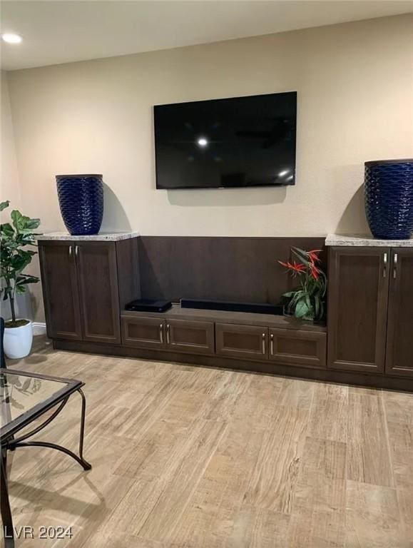 living room with light hardwood / wood-style floors