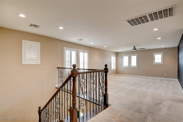 5301 Fairbranch Ln, Las Vegas, NV 89135 - hallway featuring baseboards, an upstairs landing, recessed lighting, and visible vents