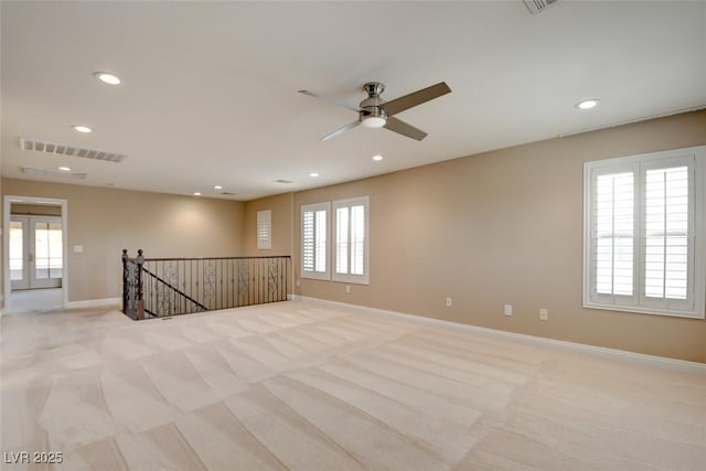 5301 Fairbranch Ln, Las Vegas, NV 89135 - spare room with light colored carpet, plenty of natural light, ceiling fan, and baseboards