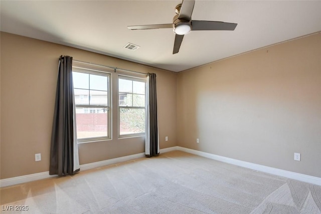5301 Fairbranch Ln, Las Vegas, NV 89135 - empty room featuring a ceiling fan, baseboards, visible vents, and light carpet