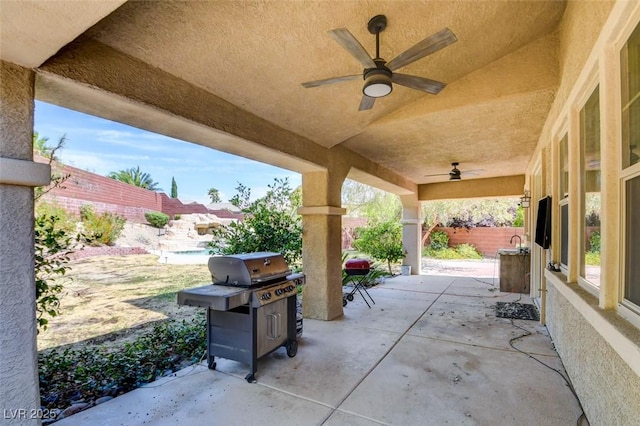 5301 Fairbranch Ln, Las Vegas, NV 89135 - view of patio / terrace featuring ceiling fan, fence, and a grill