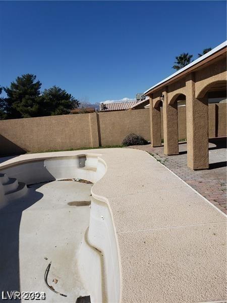 exterior space with a fenced backyard