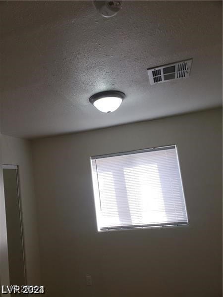 room details featuring a textured ceiling