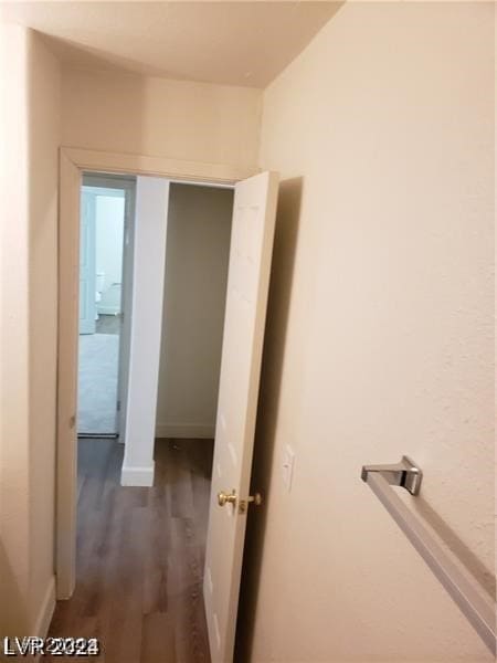 hallway featuring dark hardwood / wood-style floors